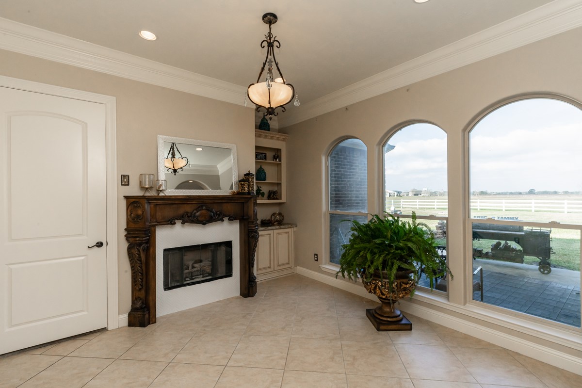 10940 Sheila Lane Beaumont, TX 77705 - Photo 23 of 50 a living room with furniture and a fireplace