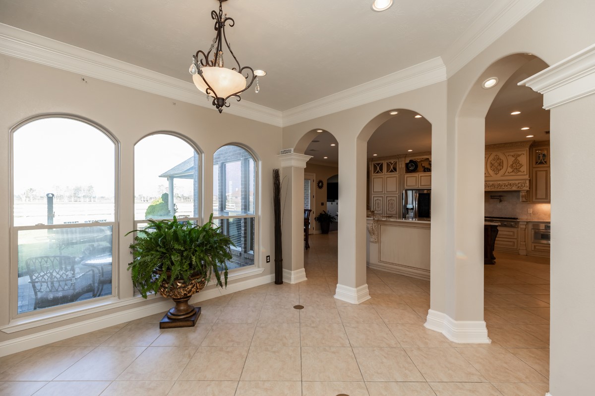 10940 Sheila Lane Beaumont, TX 77705 - Photo 24 of 50 a view of entryway with livingroom and chandelier