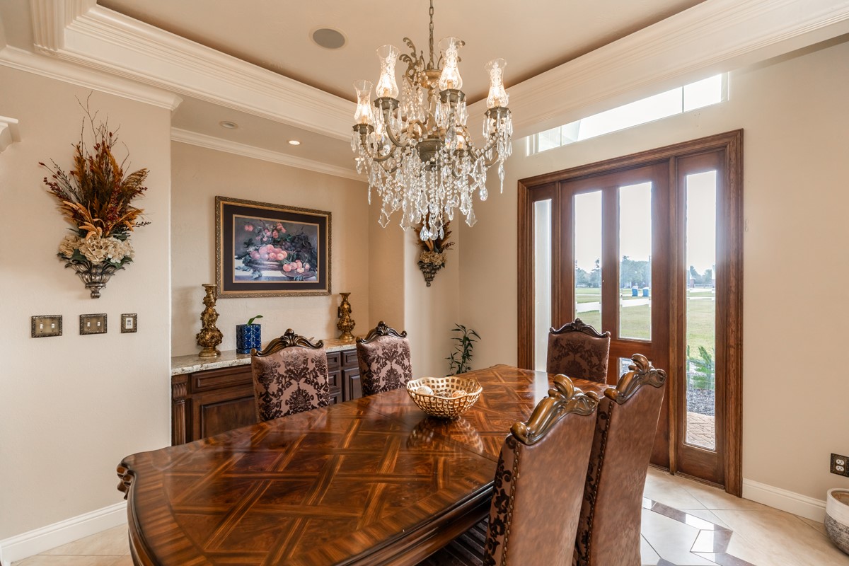 10940 Sheila Lane Beaumont, TX 77705 - Photo 8 of 50 a view of a dining room with furniture window and wooden floor
