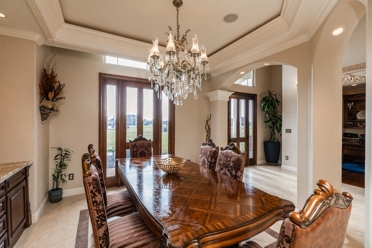 10940 Sheila Lane Beaumont, TX 77705 - Photo 9 of 50 a view of a dining room with furniture and chandelier