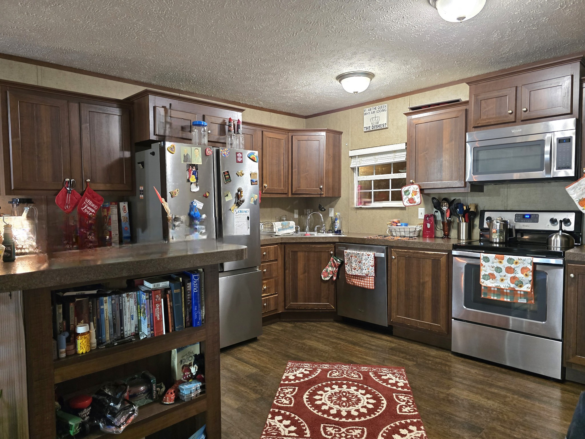 502 Case Road Prospect, TN 38477 - Photo 12 of 20 a kitchen with granite countertop lots of stainless steel appliances granite countertop a refrigerator and sink