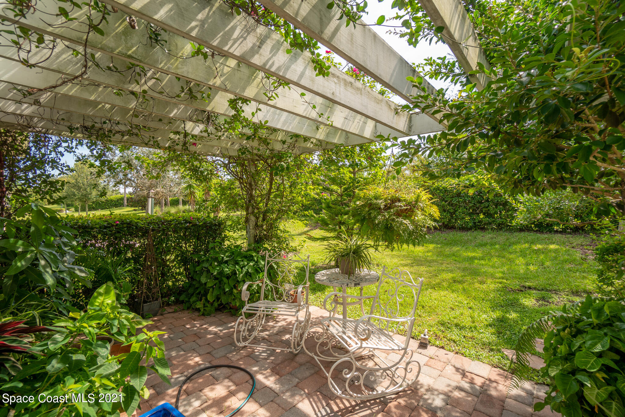7131 Ralston Street Melbourne, FL 32940 - Photo 22 of 35 Pergola Covered Paver Patio