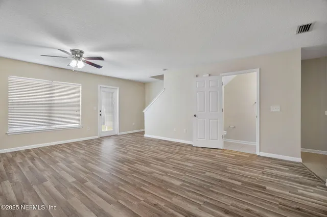a bathroom with a sink a mirror and vanity