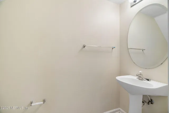 a view of a storage & utility room with a washer dryer