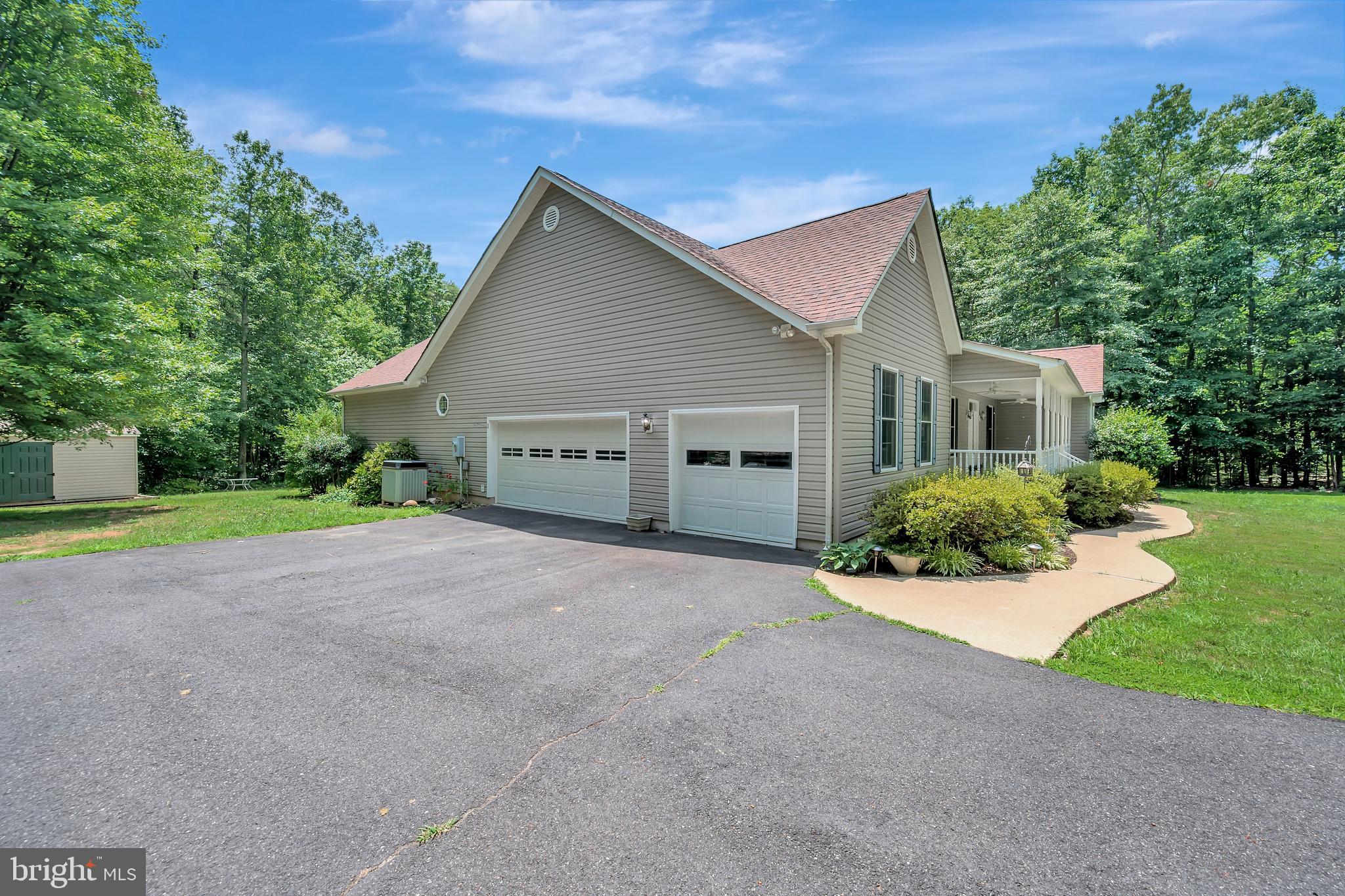 31342 Paynes Farm Locust Grove, VA 22508 - Photo 2 of 33 Three-Car Garage and paved parking area