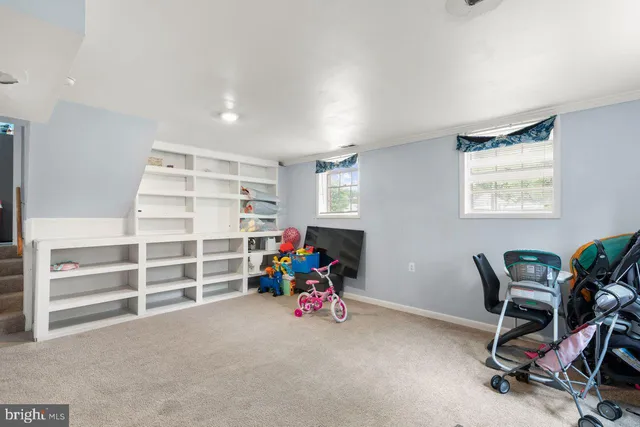 a view of a deck with a large window