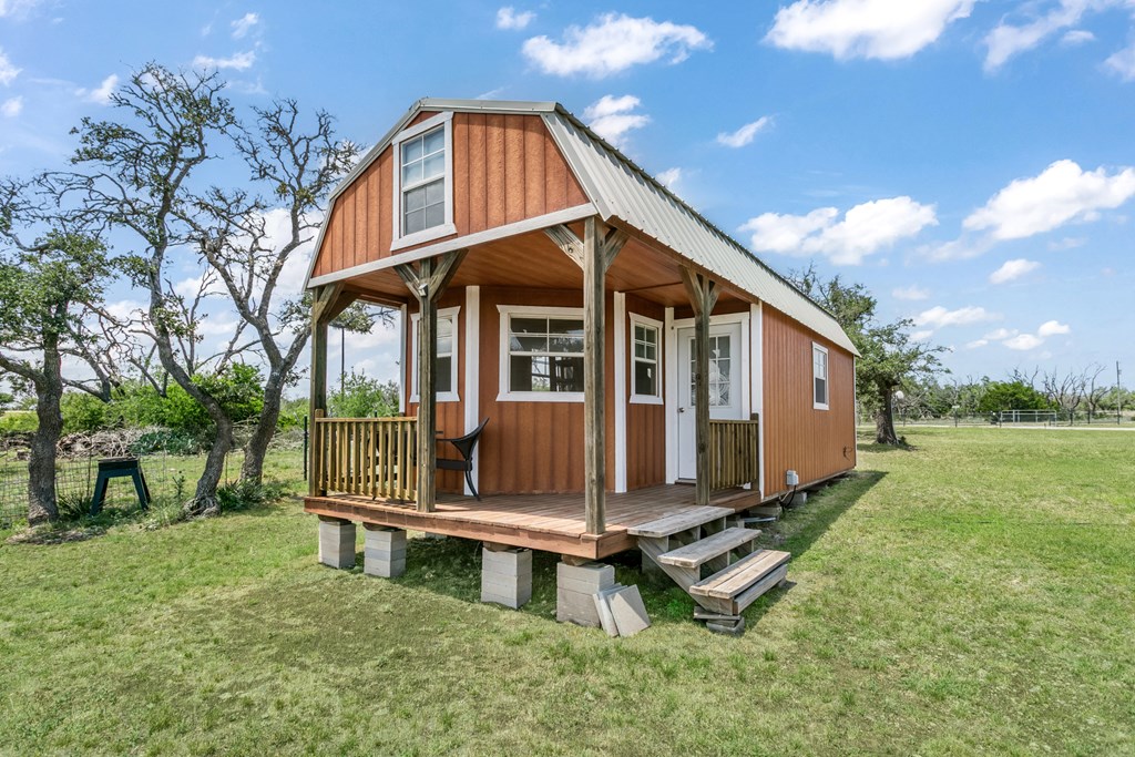 134 Concho Trail Harper, TX 78631 - Photo 24 of 31 a view of a small house with backyard