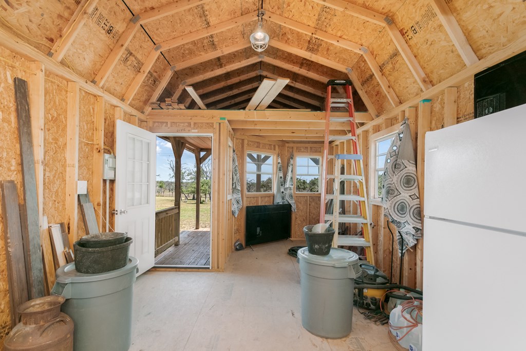 134 Concho Trail Harper, TX 78631 - Photo 26 of 31 a view of a patio with couple of chairs and potted plants