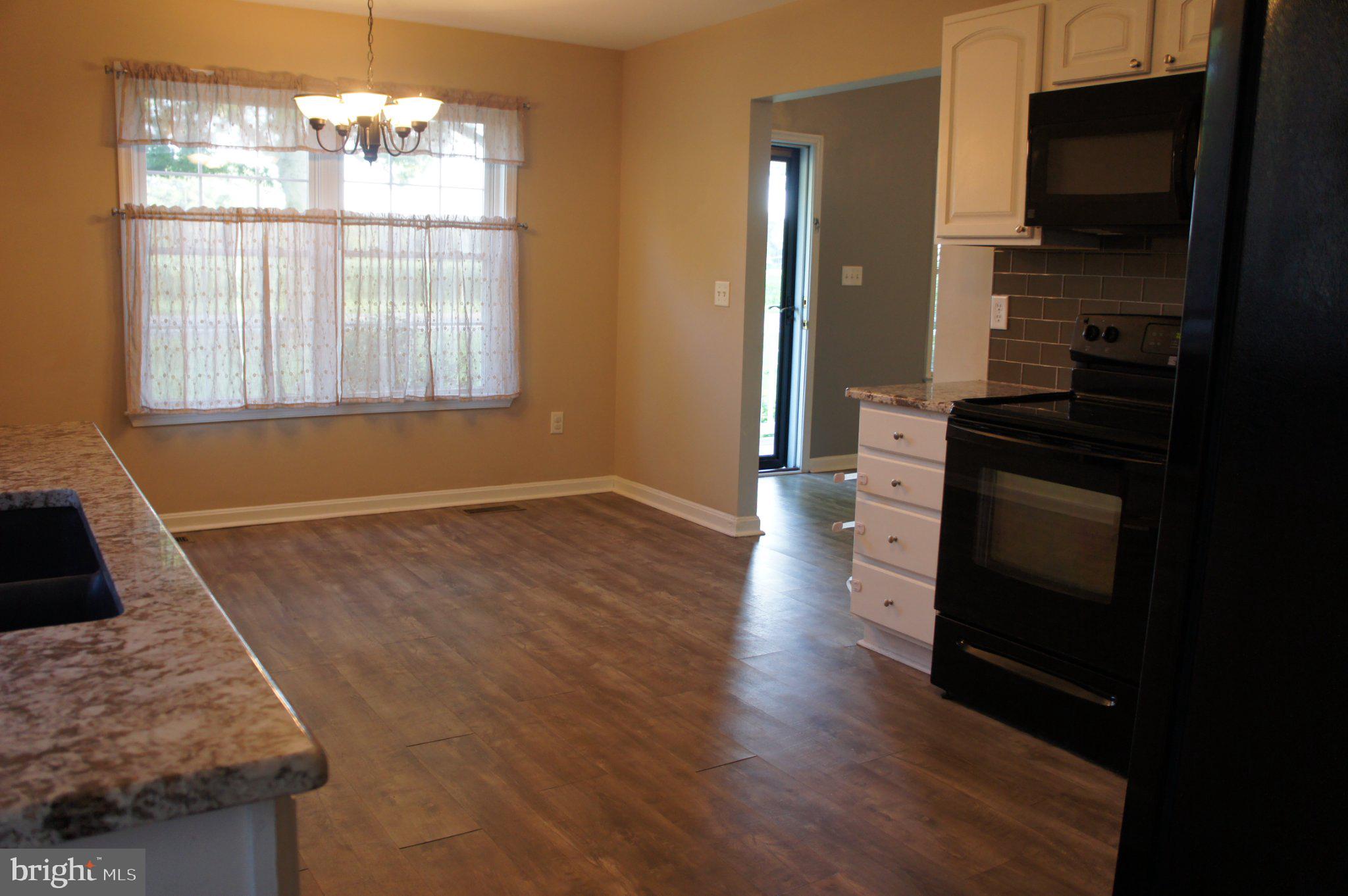 8981 Sharptown Road Laurel, DE 19956 - Photo 14 of 34 Bright and inviting kitchen space.