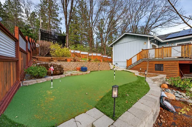 a house view with a garden space