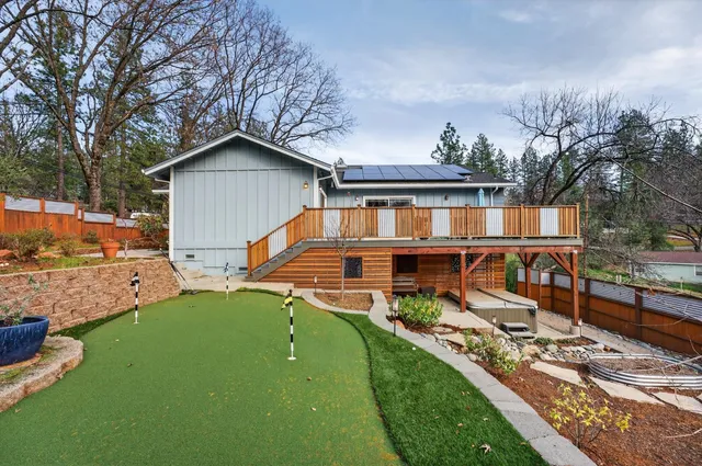a view of a backyard with a garden