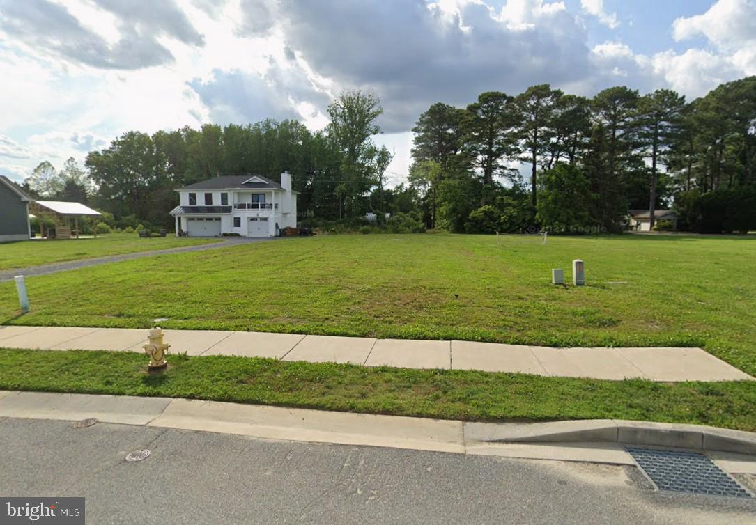 119 Prospect Drive Berlin, MD 21811 - Photo 2 of 2 a front view of a house with a yard
