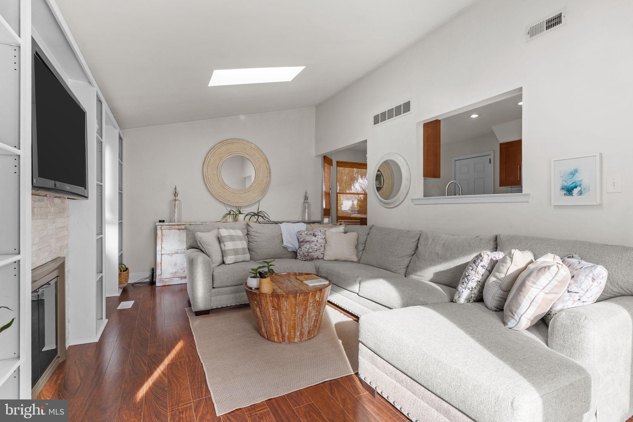 105 South Timber Road Holland, PA 18966 - Photo 14 of 34 a living room with furniture and a fireplace