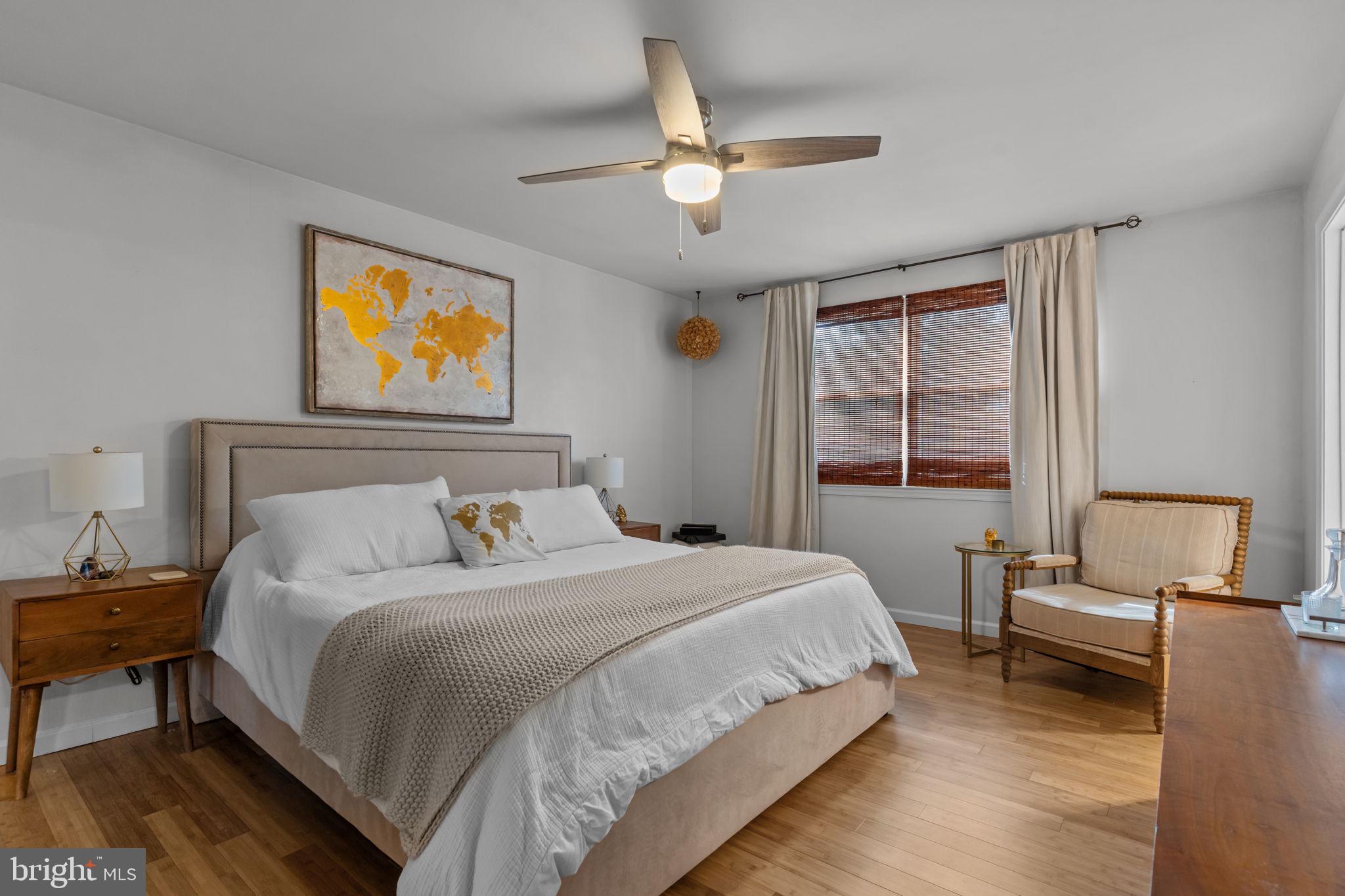 105 South Timber Road Holland, PA 18966 - Photo 18 of 34 a bedroom with a bed and a chandelier