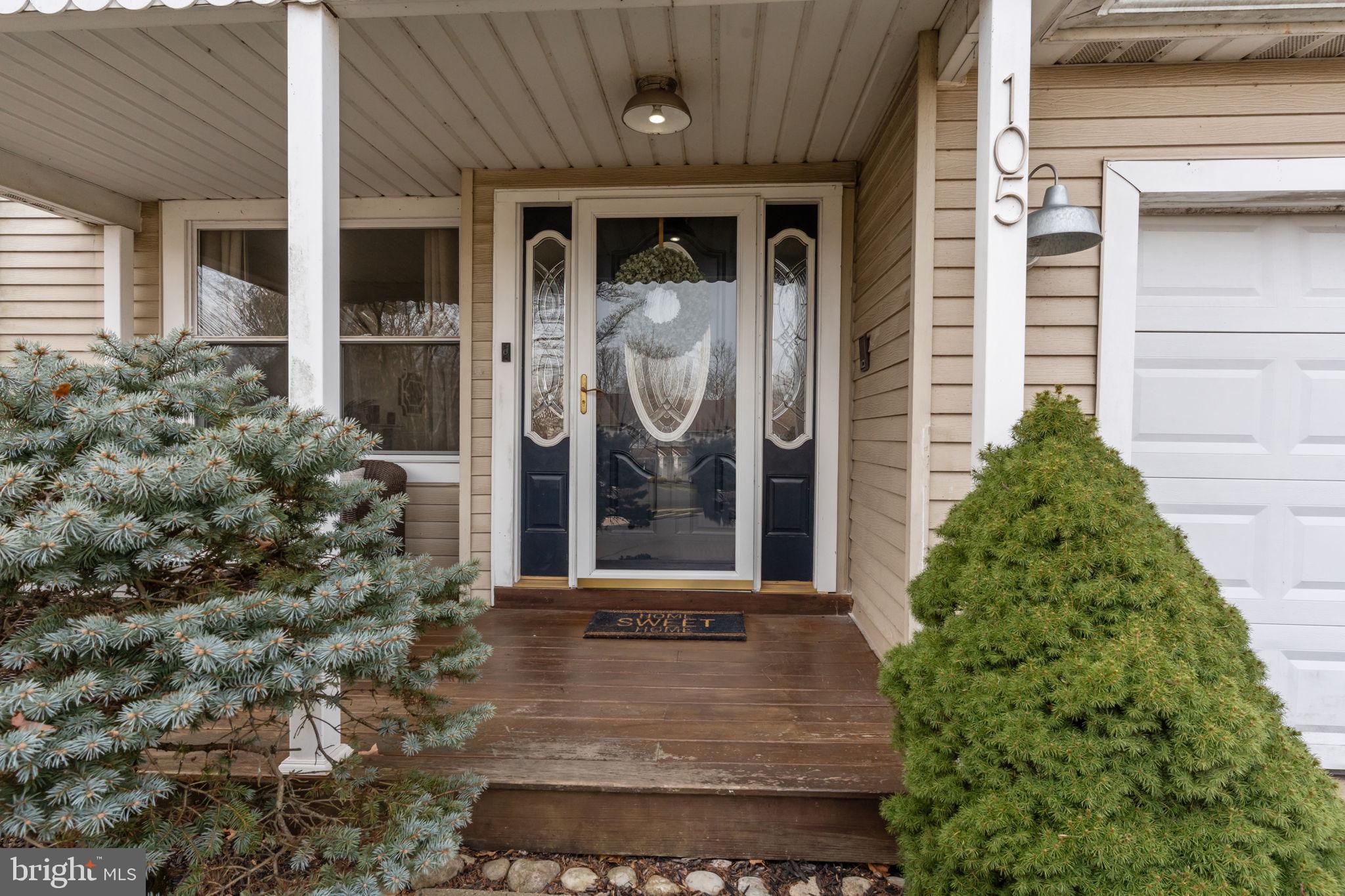 105 South Timber Road Holland, PA 18966 - Photo 2 of 34 front view of a house with a porch