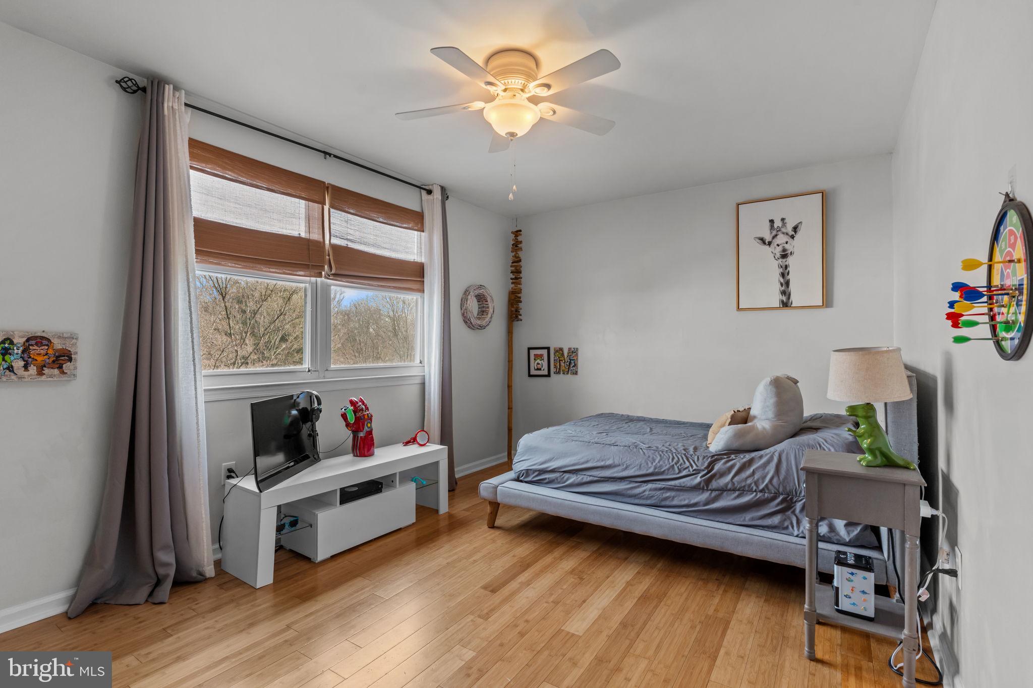 105 South Timber Road Holland, PA 18966 - Photo 26 of 34 a living room with furniture fireplace and flat screen tv