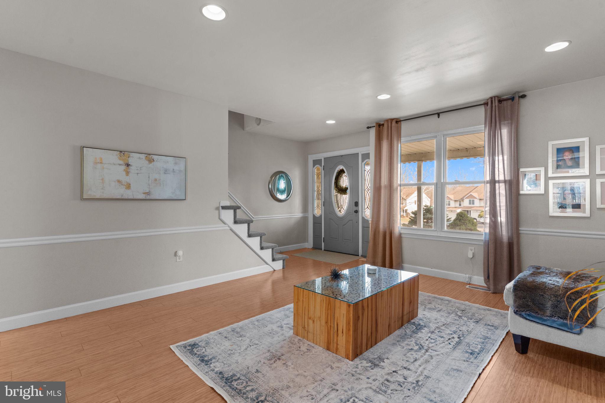 105 South Timber Road Holland, PA 18966 - Photo 4 of 34 a living room with furniture and a window