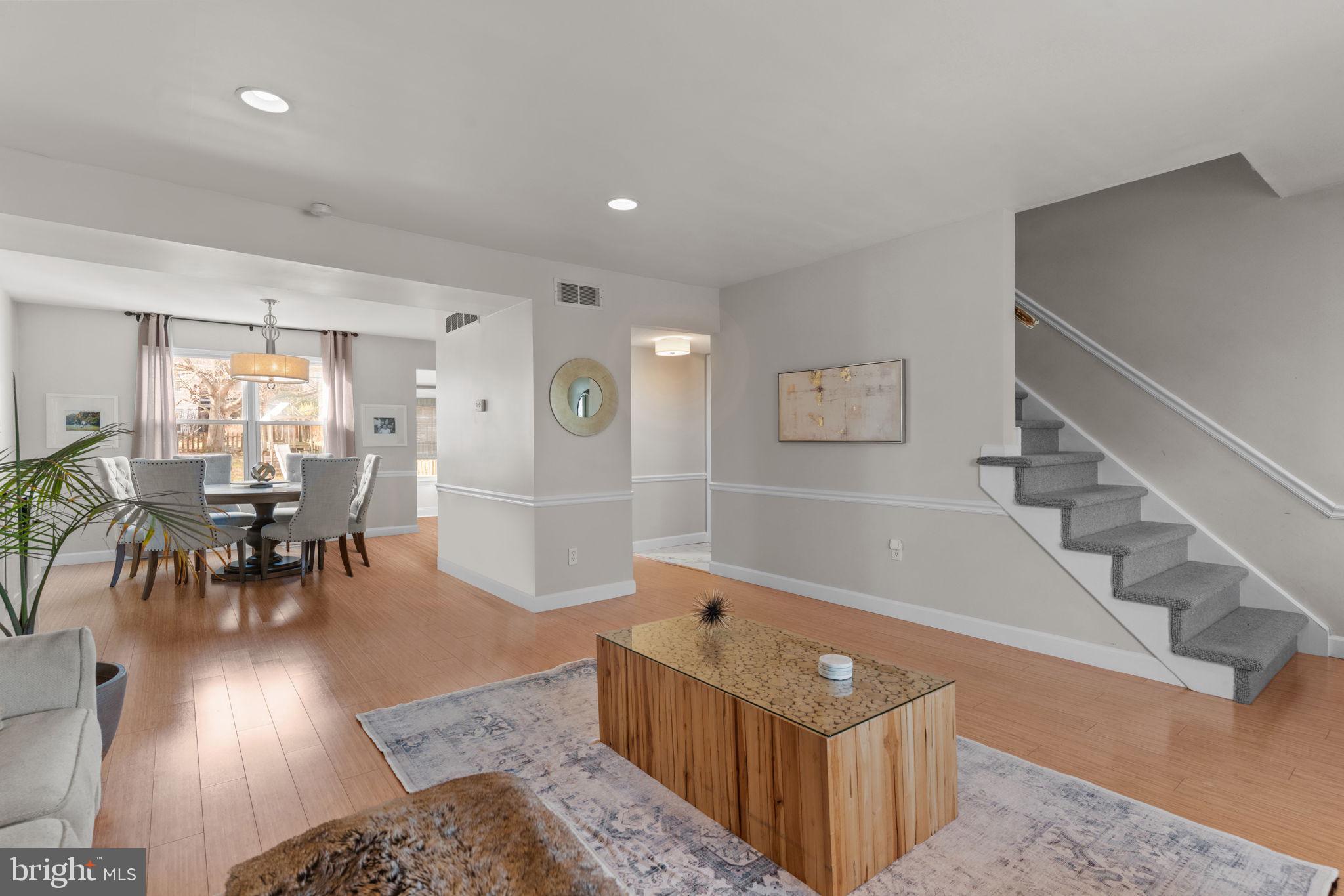 105 South Timber Road Holland, PA 18966 - Photo 5 of 34 a living room with furniture and a dining table