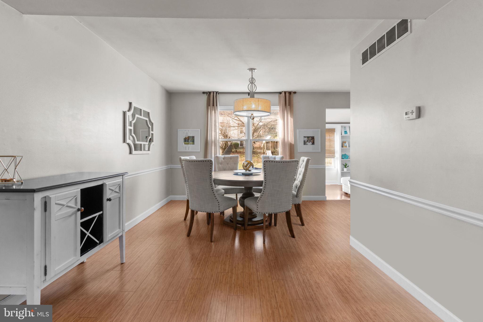 105 South Timber Road Holland, PA 18966 - Photo 6 of 34 a view of a dining room with furniture window and wooden floor