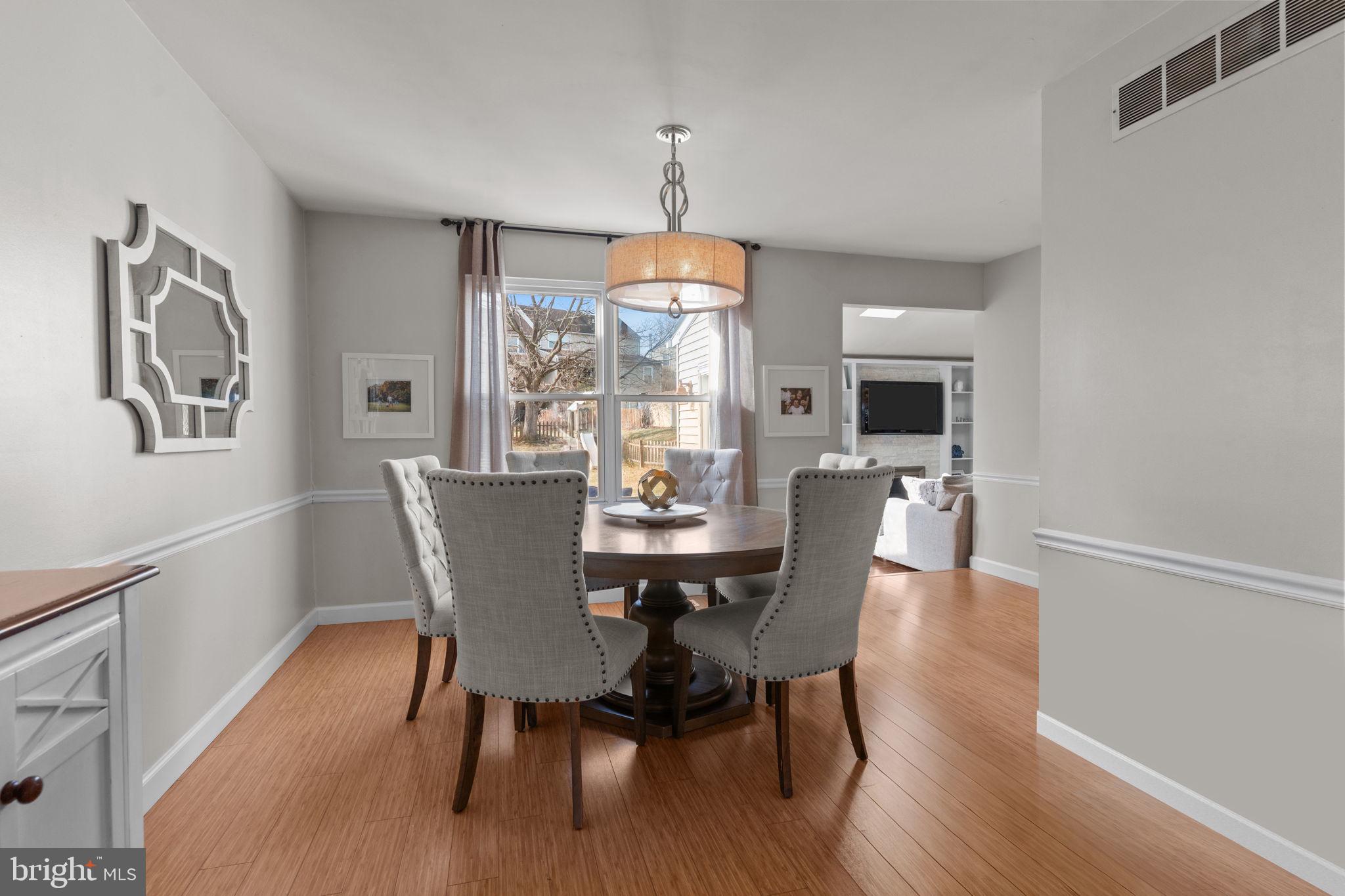 105 South Timber Road Holland, PA 18966 - Photo 7 of 34 a view of a dining room with furniture window and wooden floor