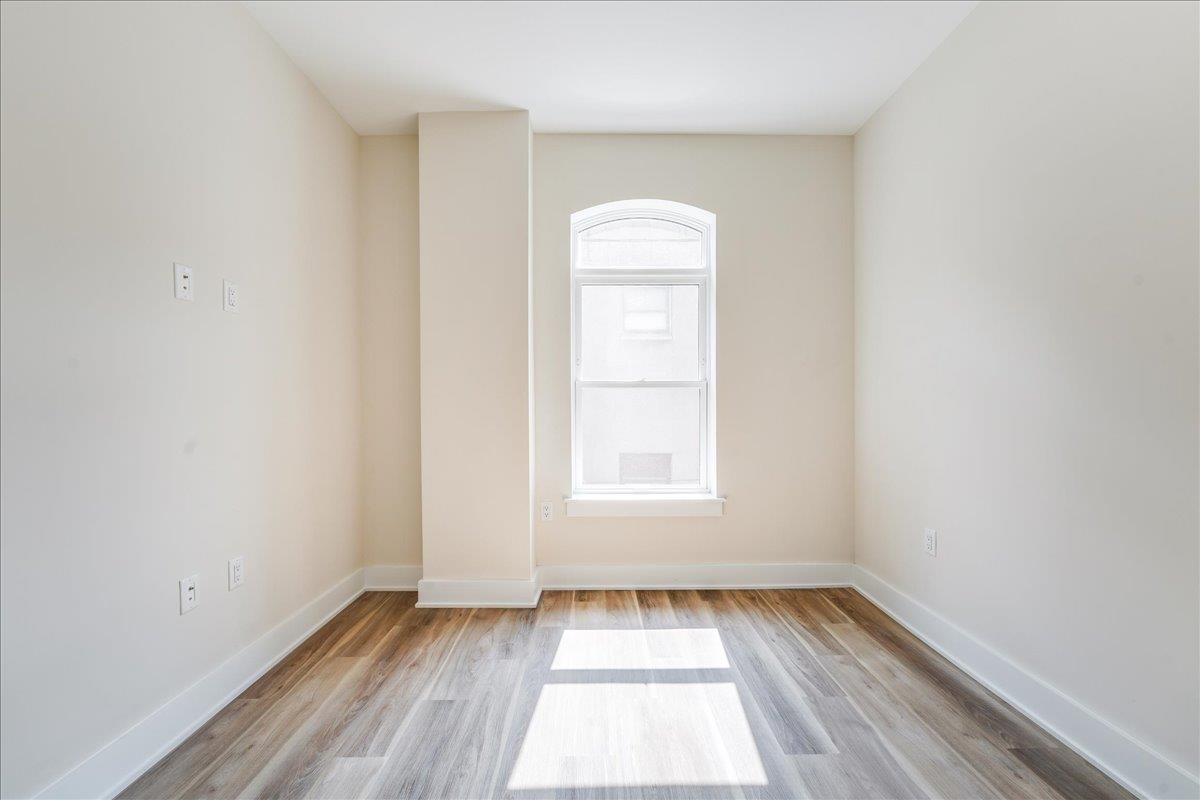 237 Washington Street, Unit 204 Hoboken, NJ 07030 - Photo 11 of 34 an empty room with a window