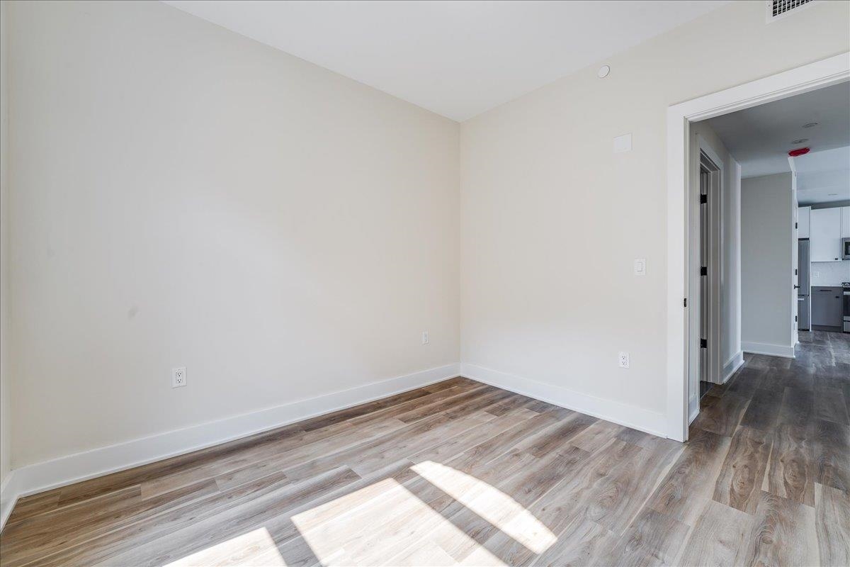 237 Washington Street, Unit 204 Hoboken, NJ 07030 - Photo 10 of 34 a view of a room with wooden floor