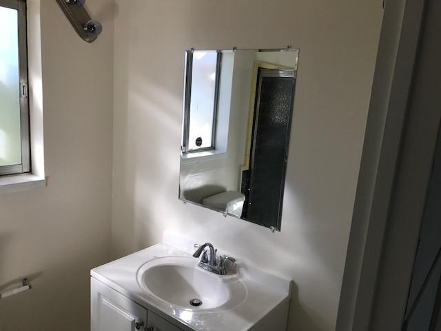 164 Bardet Road Woodside, CA 94062 - Photo 12 of 17 a bathroom with a sink and a mirror