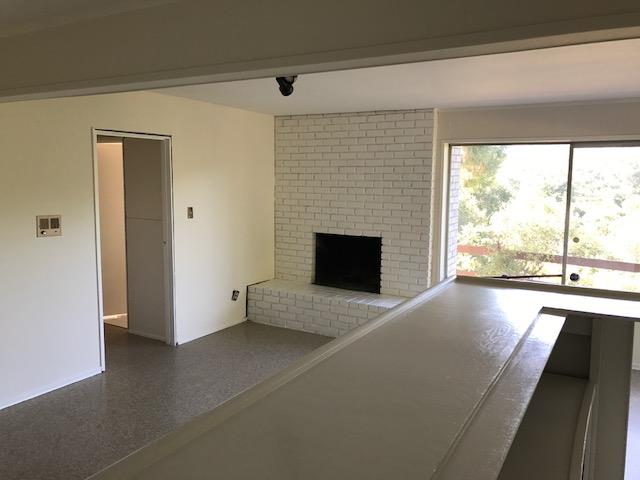 164 Bardet Road Woodside, CA 94062 - Photo 14 of 17 a view of empty room with fireplace and window
