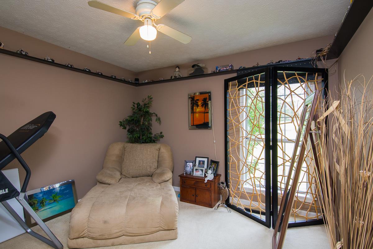 7129 Swift Road Greenbrier, TN 37073 - Photo 22 of 25 a room with furniture and a window