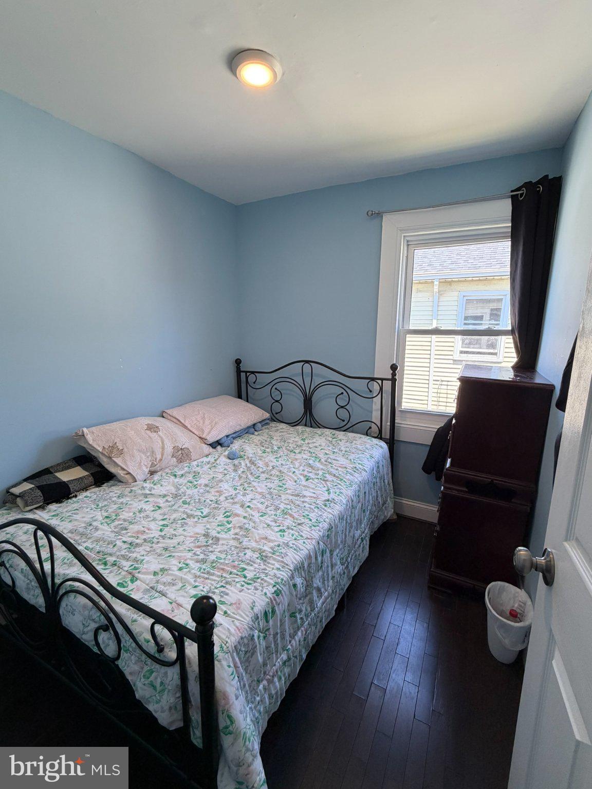 203 Sollers Point Road Dundalk, MD 21222 - Photo 12 of 16 Cozy bedroom with natural light.
