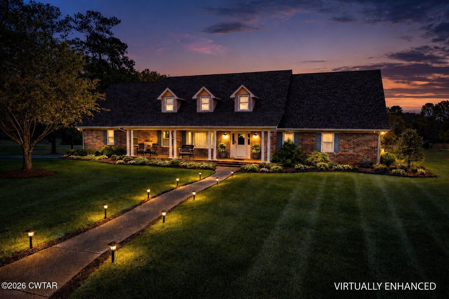 812 Pipkin Road Jackson, TN 38305 - Photo 2 of 49 Front Dusk Virtually Enhanced
