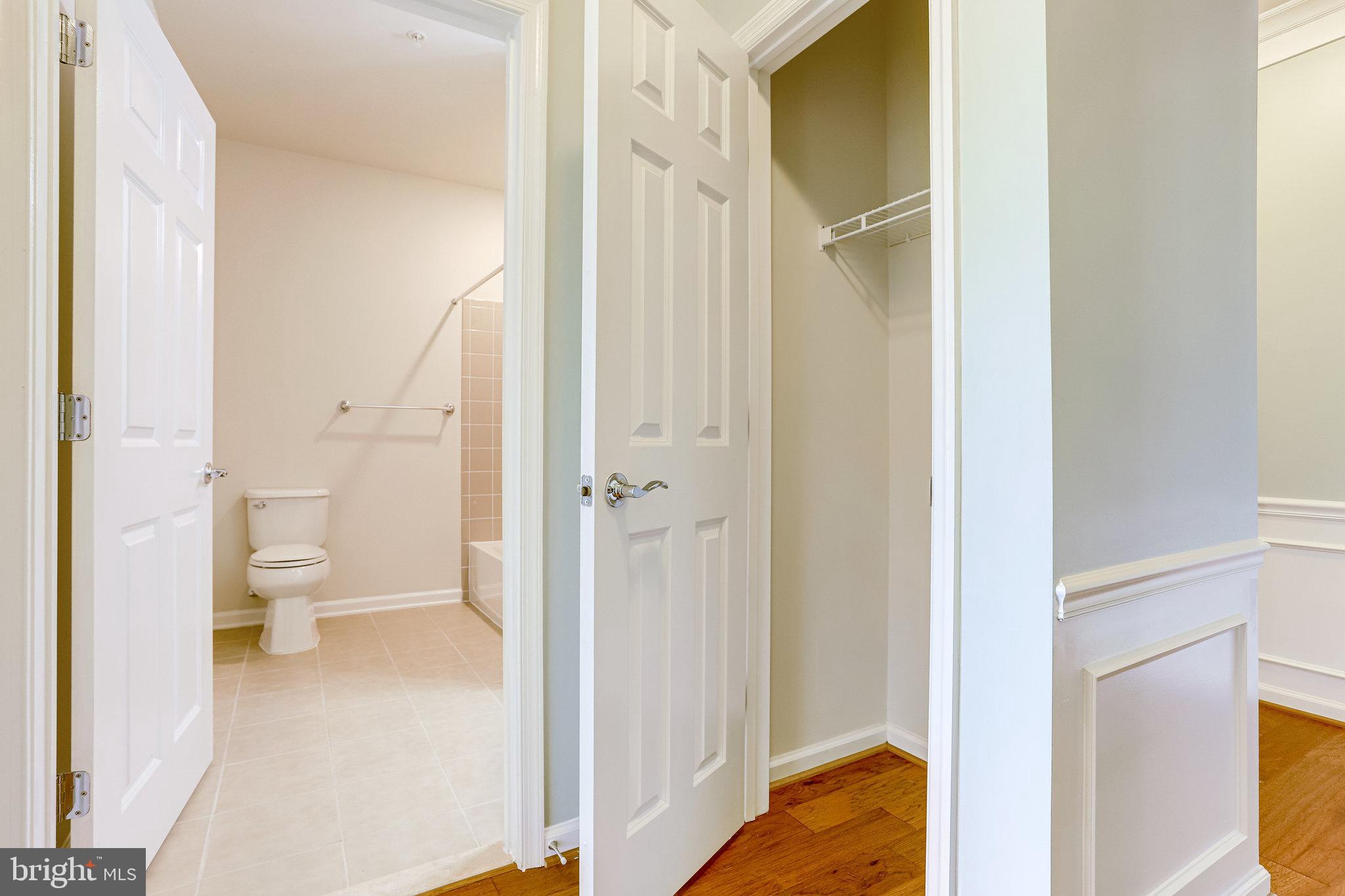 20580 Hope Spring Terrace, Unit 207 Ashburn, VA 20147 - Photo 28 of 61 a bathroom with a sink and a toilet