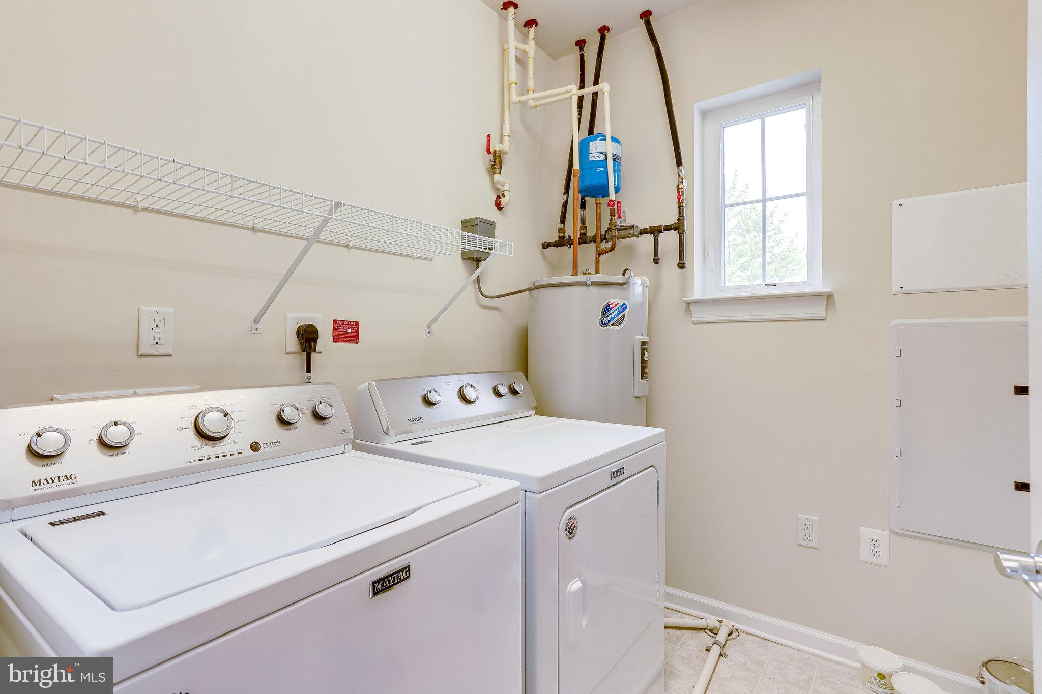 20580 Hope Spring Terrace, Unit 207 Ashburn, VA 20147 - Photo 29 of 61 Separate Laundry Room with a Window