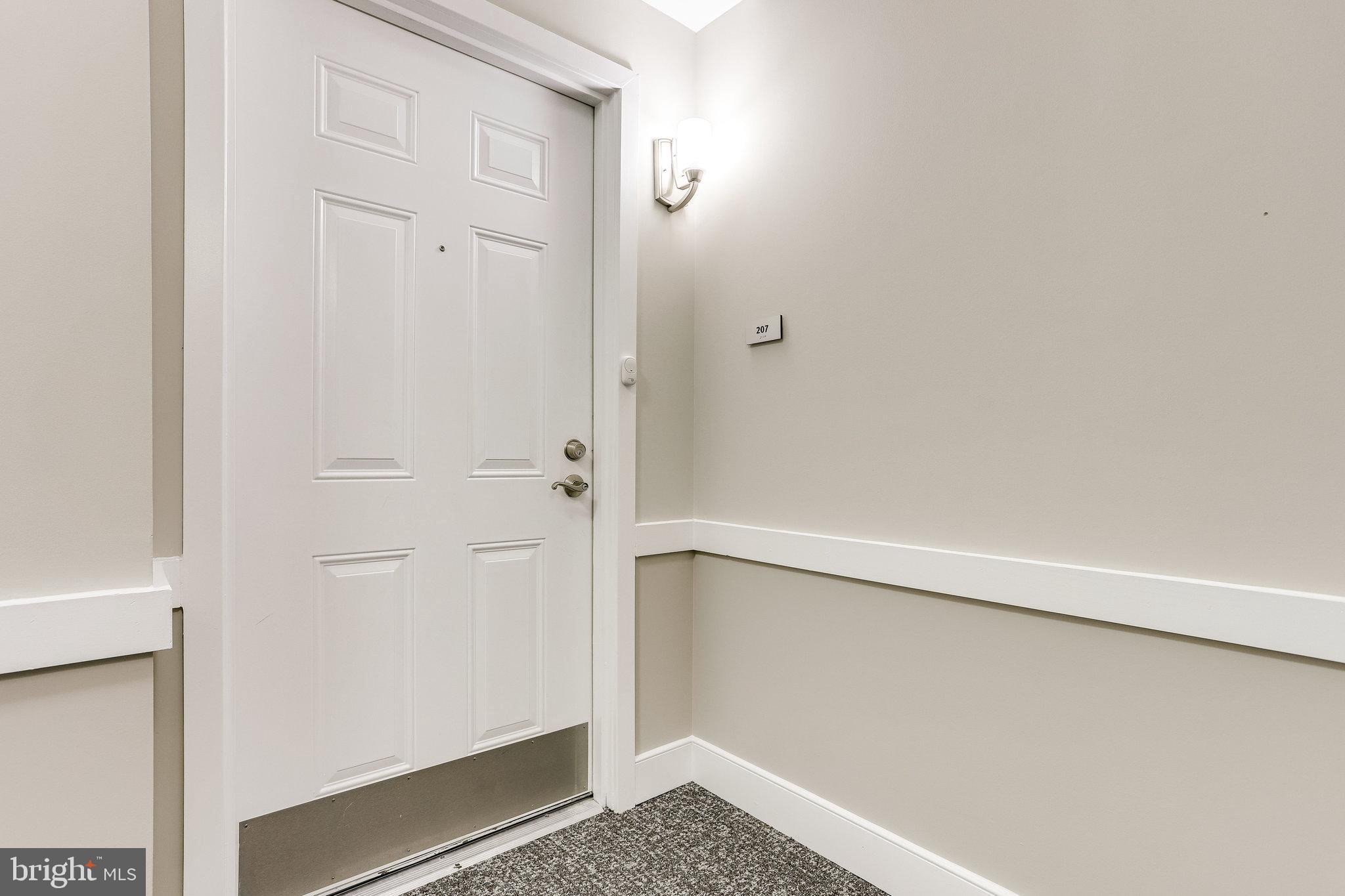 20580 Hope Spring Terrace, Unit 207 Ashburn, VA 20147 - Photo 4 of 61 Welcome to Unit 207, The Clarion model.