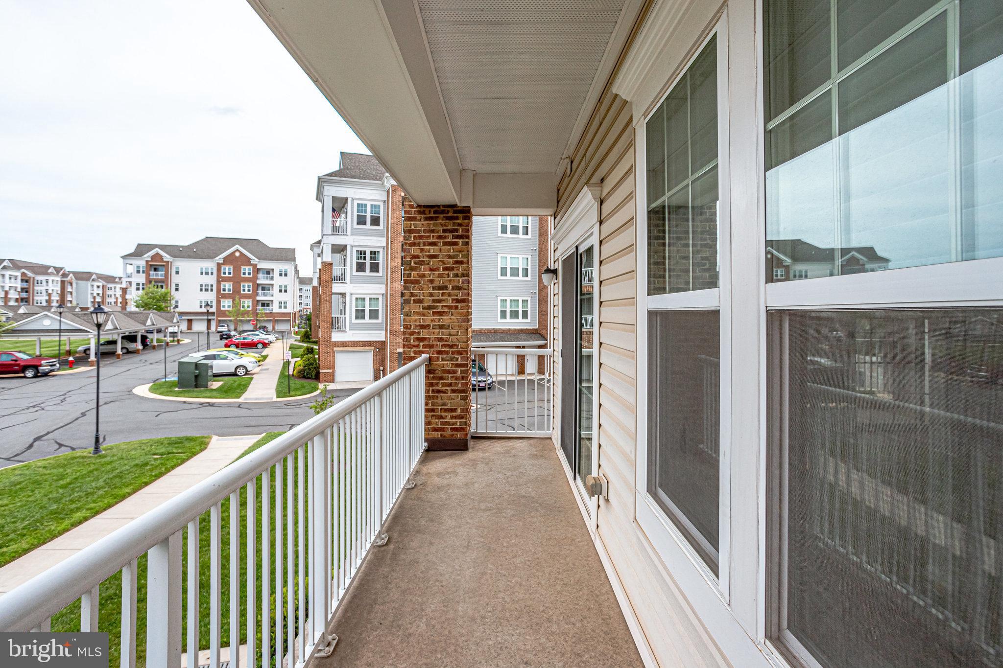 20580 Hope Spring Terrace, Unit 207 Ashburn, VA 20147 - Photo 31 of 61 Lg Balcony located in the front of the Building