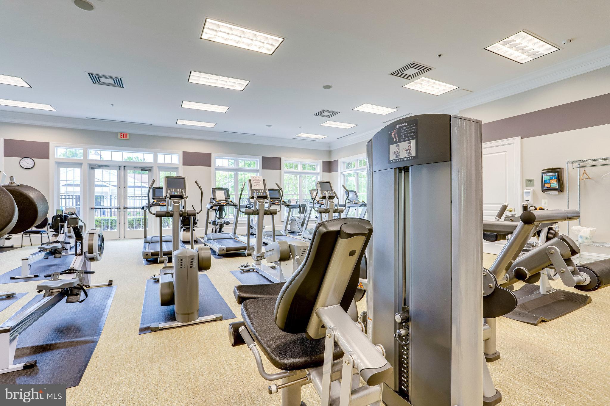 20580 Hope Spring Terrace, Unit 207 Ashburn, VA 20147 - Photo 54 of 61 a view of a room with gym equipment