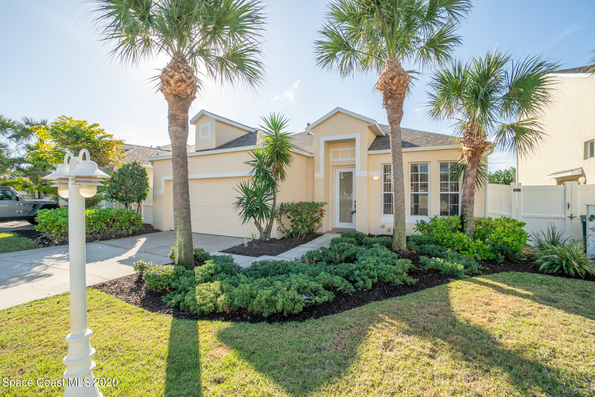 153 Babylon Lane Melbourne, FL 32903 - Photo 2 of 32 a view of house with swimming pool outdoor seating