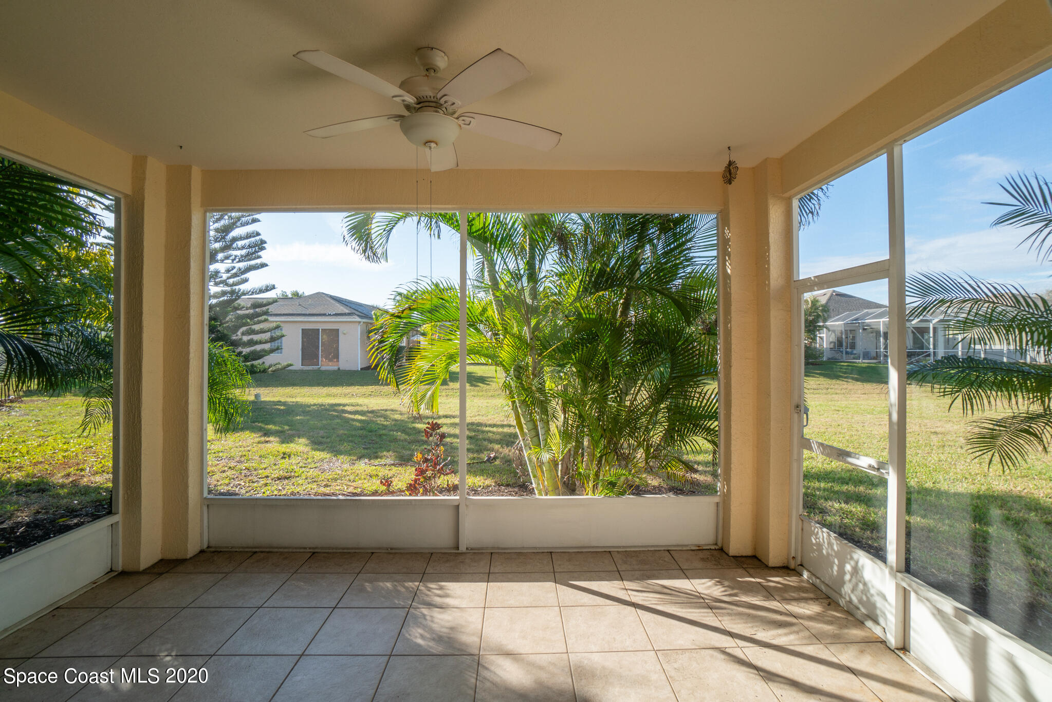 153 Babylon Lane Melbourne, FL 32903 - Photo 3 of 32 a view of a room with a large window