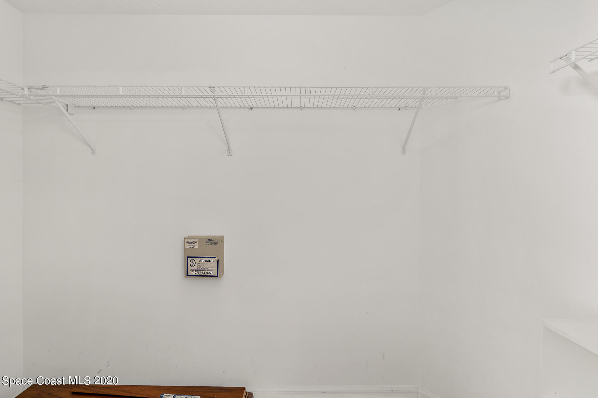 153 Babylon Lane Melbourne, FL 32903 - Photo 23 of 32 a view of a rack on the wall