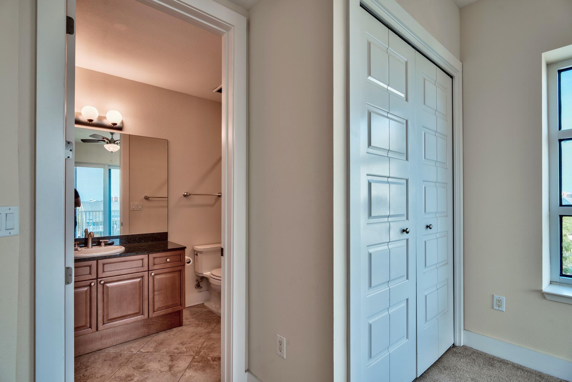 211 Durango Road, Unit 317 Destin, FL 32541 - Photo 28 of 47 a kitchen with cabinets and a stove top oven
