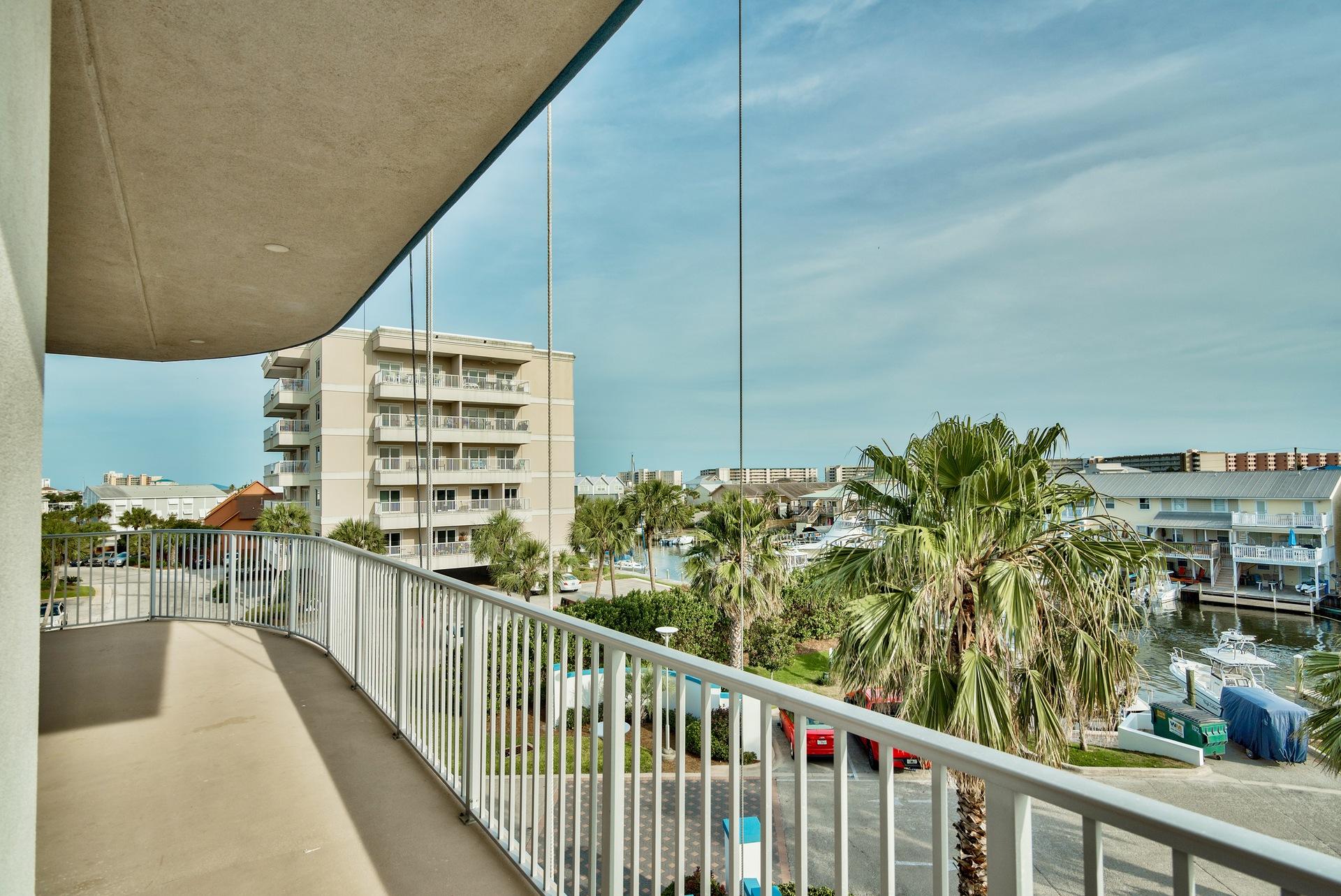 211 Durango Road, Unit 317 Destin, FL 32541 - Photo 7 of 47 a view of a balcony and chairs
