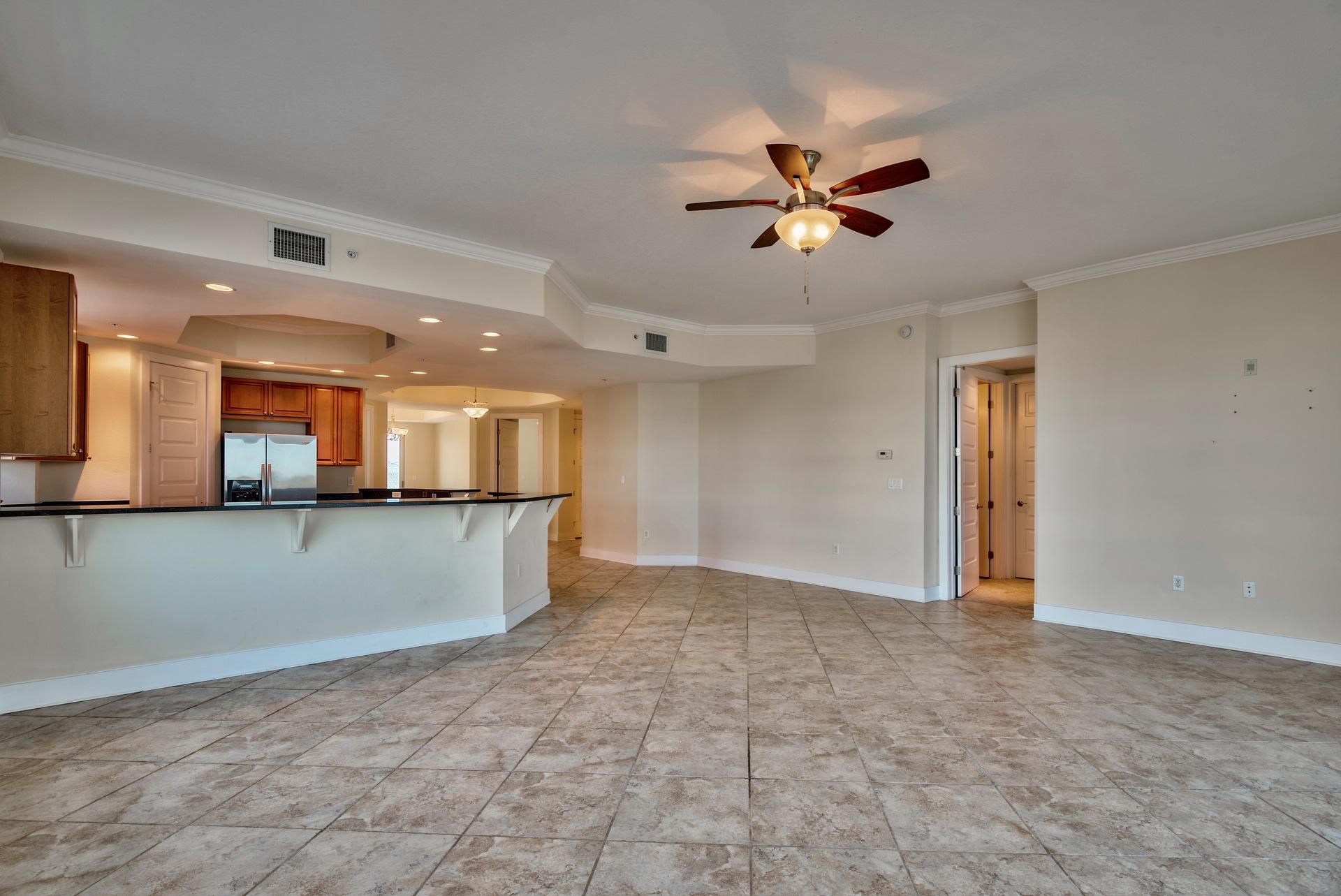 211 Durango Road, Unit 317 Destin, FL 32541 - Photo 9 of 47 a view of a livingroom with a ceiling fan and window