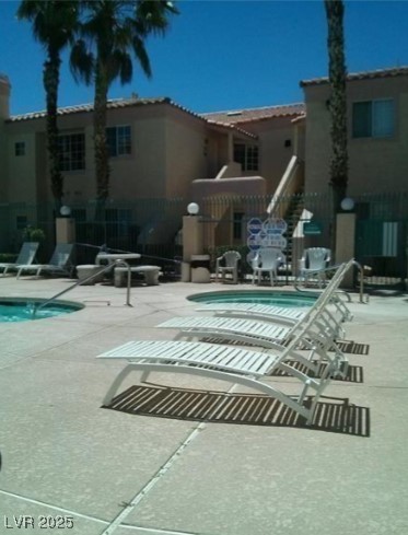 1851 Hillpointe Road, Unit 2112 Henderson, NV 89074 - Photo 7 of 15 Pool featuring a patio and a hot tub