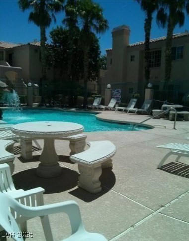 1851 Hillpointe Road, Unit 2112 Henderson, NV 89074 - Photo 8 of 15 Pool with a patio area and fence