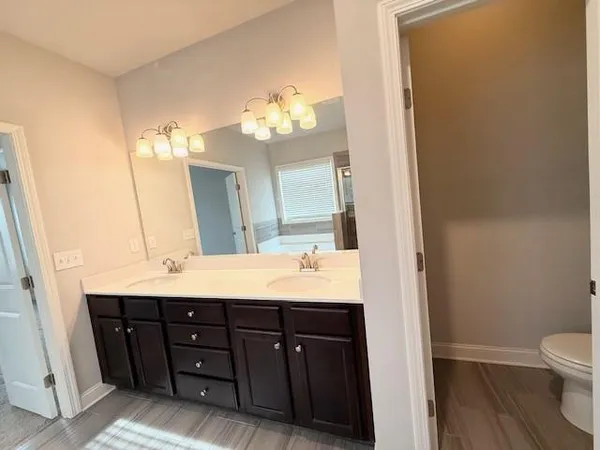 a view of a hallway with a window