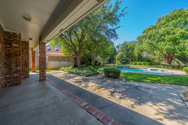 a view of backyard with green space
