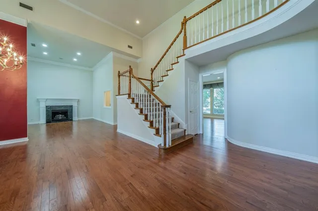 a kitchen with stainless steel appliances kitchen island granite countertop a stove sink and microwave