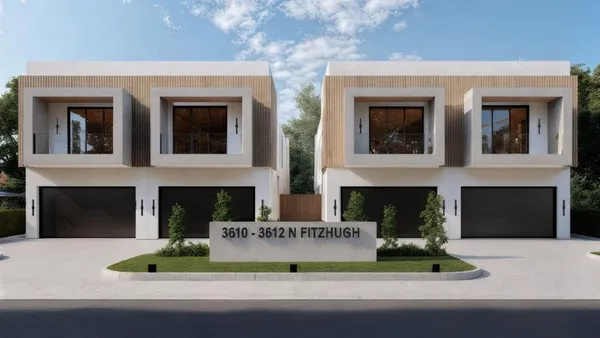 a view of two windows in a house