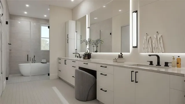 a spacious bathroom with a double vanity sink a mirror and a bathtub