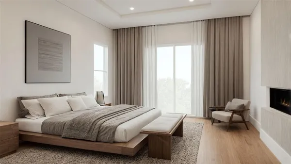 a bedroom with a bed and a large mirror